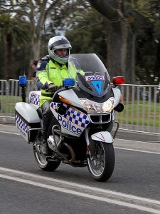 police motorcycle enforcing mentally ill laws